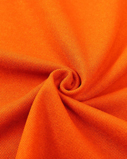 Men's stylish orange polo shirt with striking details - casual attire for everyday wear